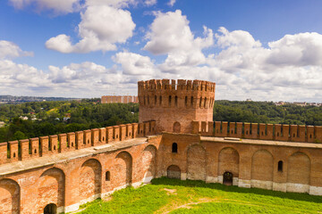 vintage brick fortress wall on green background filmed from drone