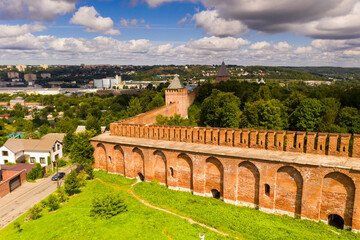 Obraz premium vintage brick fortress wall on green background filmed from drone