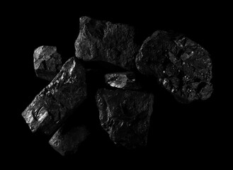 Pile black coal isolated on black background and texture, clipping path and top view
