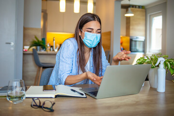 Fototapeta na wymiar Businessman or office worker are working and video meeting online conference and wear mask for protect Covid-19 or corona virus disease but business must be continuous, healthcare concept