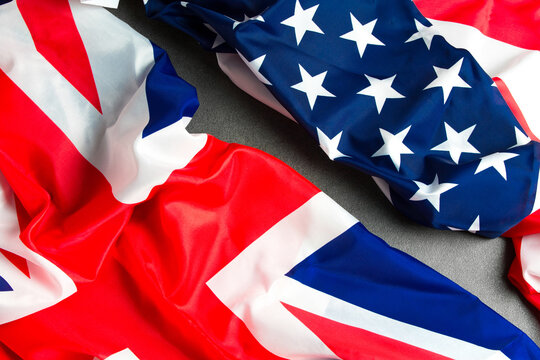 UK flag and USA Flag на stone background . Relations between countries .The view from the top.