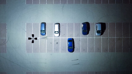 Cars at parking near hipermarket at night. 