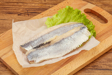 Herring fillet with salad leaves