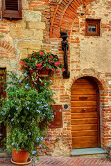 Fototapeta na wymiar Brick and stone building sreet scene in Certaldo, Italy