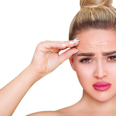 Young sad woman holds wrinkles on forehead.