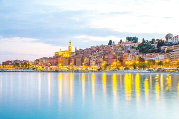 Menton mediaeval town on the French Riviera in the Mediterranean during sunset, France.