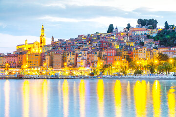 Menton mediaeval town on the French Riviera in the Mediterranean during sunset, France.