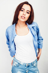 young pretty stylish brunette hipster girl posing emotional isolated on white background happy smiling cool smile, lifestyle people concept