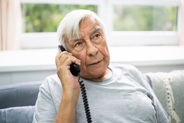 Senior Old Man Talking On Telephone