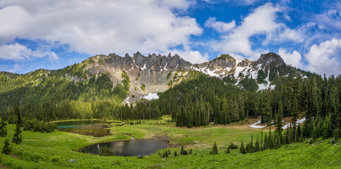 Mountain Valley In Springtime WIth Clouds and Blue Skies