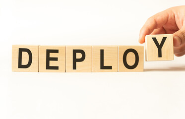 Word deploy made with wood building blocks, stock image