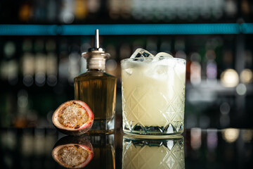 Expert barman is making cocktail at night club