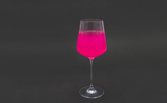 Pink Drink In Wine Glass