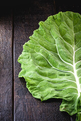 large kale leaves, loose and green, used in cooking.