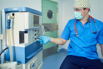 Man surgeon at work in operating room