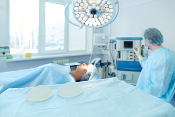 Man surgeon at work in operating room