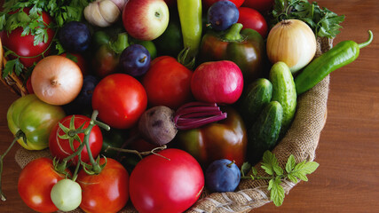 Various vegetables close-up on a wooden background. Natural fresh 