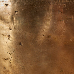 texture of yellow old copper plate with scratches and scuffs, full frame
