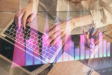 Double exposure of woman hands typing on computer and forex chart hologram drawing. Stock market invest concept.