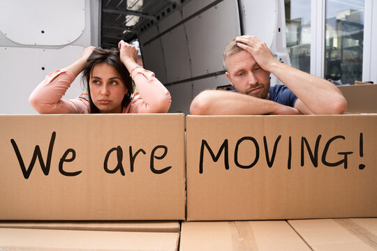 Home Move Stress. Frustrated Couple Moving