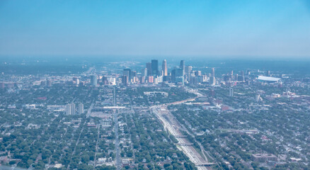 Fototapeta na wymiar above the clouds and above minneapolis minnesota from airplane