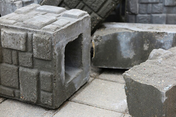 Stack of gray cement blocks at the construction site.