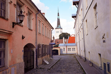 Fototapeta na wymiar Panoramic view of the central streets of Tallinn on a summer morning in Estonia. Real grain scanned film.