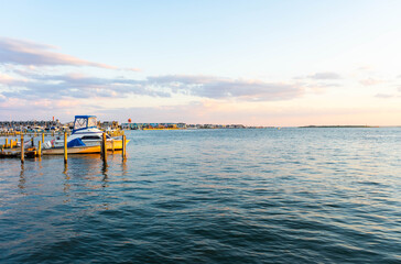 Obraz premium Scenic boats in the harbor of Long Beach Island popular vacation and beach house destination off the Jersey Shore