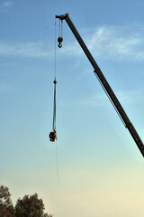 A concrete pump being moved by train