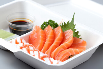 raw salmon , sliced salmon or salmon sashimi