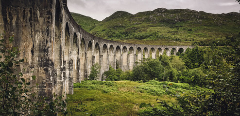 Glenfinnan Viaduct used for the famous train scenes in harry potter - obrazy, fototapety, plakaty