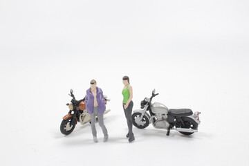 Fototapeta na wymiar a mini of figure with the moto bike