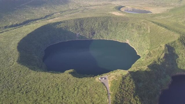 Aerial Fly Over Lagoa Negra Black Lagoon Volcanic Crater, Flores Island, Azores
