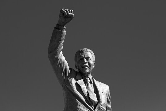 Statue of Nelson Mandela in black and white with raised fist near Drakenstein Correctional Center, Paarl, South Africa.
