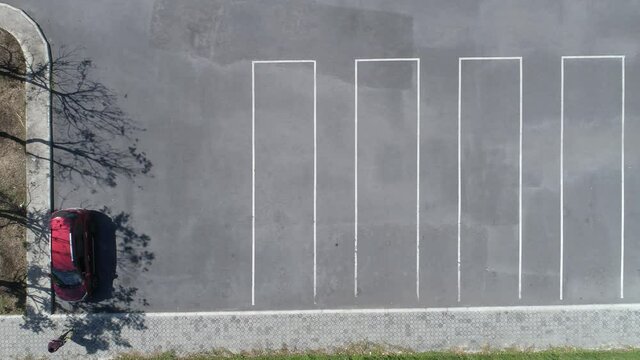 Aerial view Top down Drone shot Flying Above empty parking lot in the park	