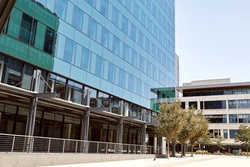 Courtyard surrounded by modern,  highrise office buildings near Union Station.  In Downtown Denver, Colorado.  USA
