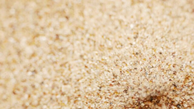Quicksand Danger. Hourglass, Countdown, Threat, and Maelstrom. The danger of sand vortex and loose sand. Super macro