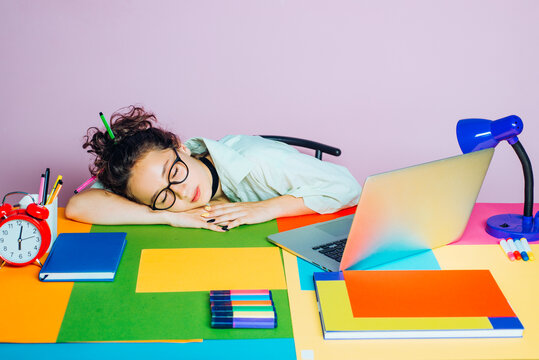 Student In Classroom. Bored Student Listening While Classmate Sleeping At Home. Education In High School, People And Emotions Concept.