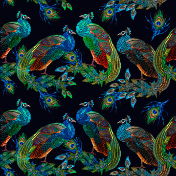 Embroidery peacocks seamless pattern. Tails of tropical birds art. Fashionable template for design of clothes