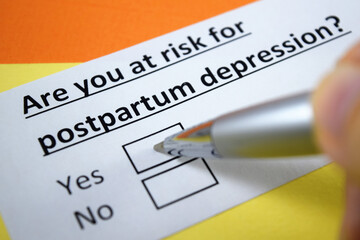 A person is answering question about postpartum depression.