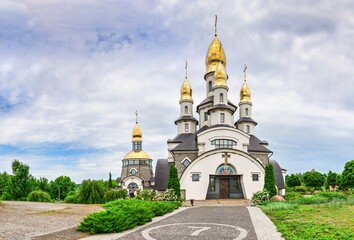 Fototapeta na wymiar Temple Complex with landscape Park in Buki, Ukraine