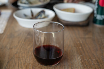 Glass of red wine on table at restaurant