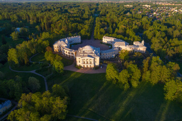 Fototapeta na wymiar View from a height to old Pavlovsky Palace in a warm May evening (aerial photography). Pavlovsk, Russia