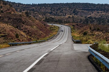 Panoramic skyline with empty road. Landscape scene and sunrise above road.