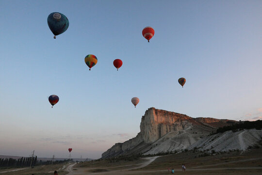 Aeronaut teams take part in a hot air balloon competition in Crimea