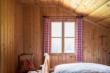 Holiday in the mountains: Rustic old wooden interior of a cabin or alpine hut