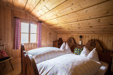 Holiday in the mountains: Rustic old wooden interior of a cabin or alpine hut