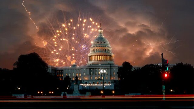July 4th Independence day show cheerful fireworks display on the US Capitol Building in Washington DC USA