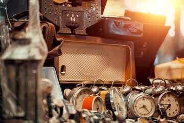 old clocks at sunday flea market countertop