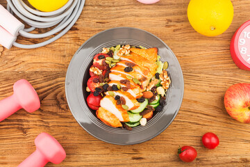 Fototapeta premium fitness and active healthy lifestyles Concept.A plate of chicken breast salad
